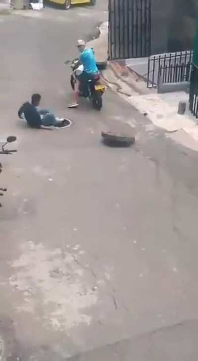 Instant Karma for stealing a manhole cover