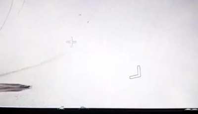 russian footage of an Ukrainian naval drone launching a smaller drone or torpedo to strike a gas platform in the Black Sea that russians have captured.