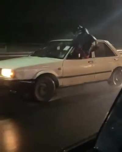 Human wiper on Kenyan Highway.