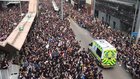 Hong Kong crowd make way for ambulances and sing Beyond's 海闊天空