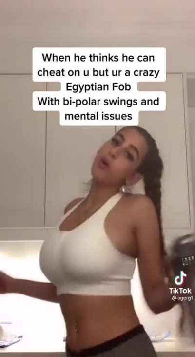 Shaking her tits