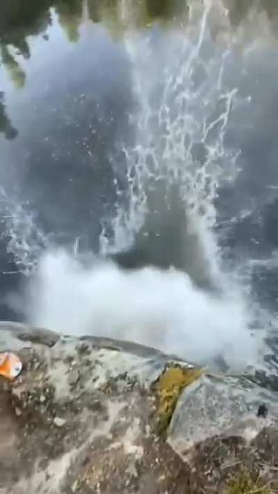 The masculine urge to push a giant rock into a large body of water