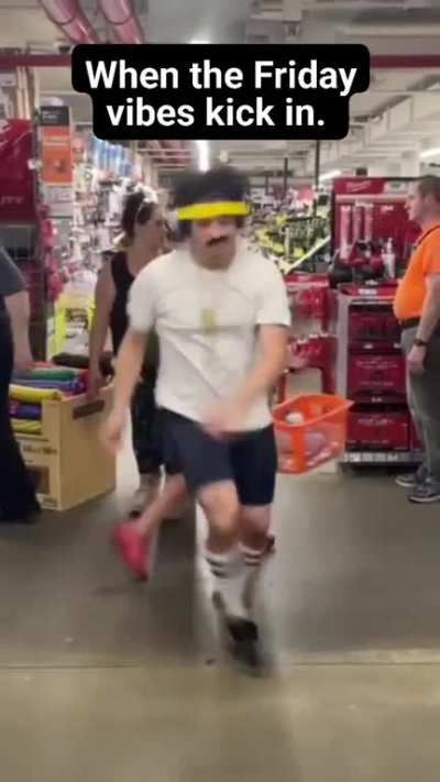 guy dancing in a supermarket while people are doing their shopping