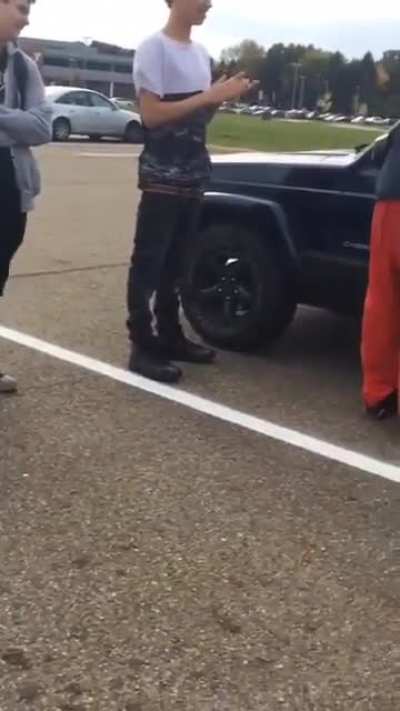 Racist bully gets kicked in the face through glass window