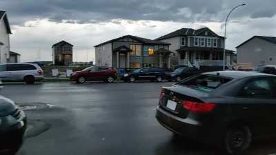 Golf ball sized hail in the NE. So many smashed windshields and dented cars.