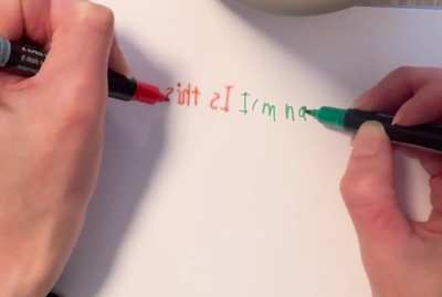 Writing with both hands at the same time different words