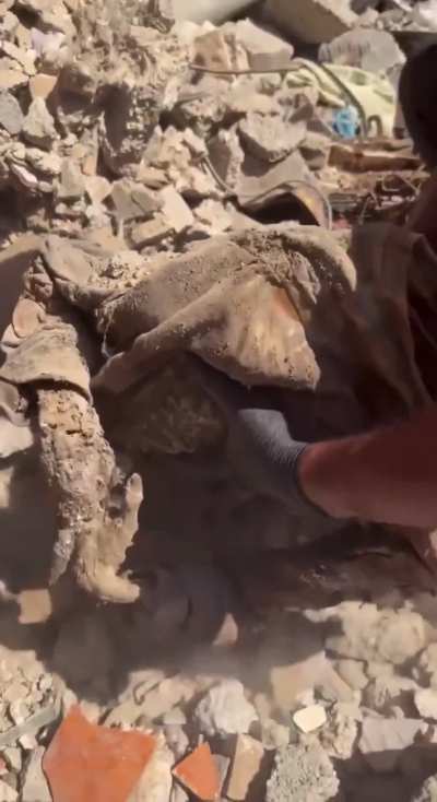 Israel wont let people into Gaza purely because they’re going to find mass graves and thousands of bodies under rubble like this. This person had their hands on the back of their head