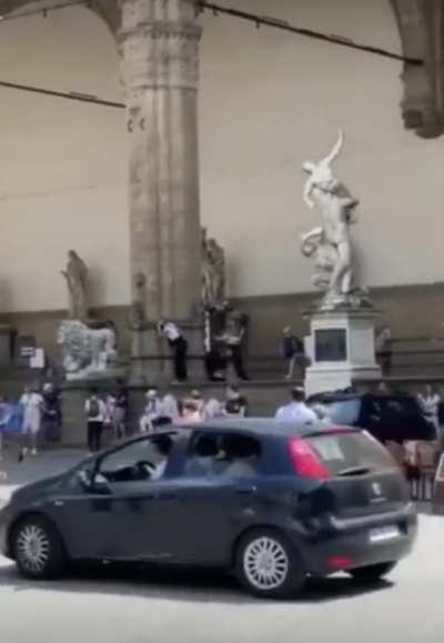 Tired of working long hot days in Florence, Italy