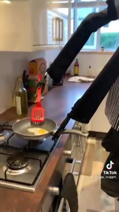 Chad fries a egg