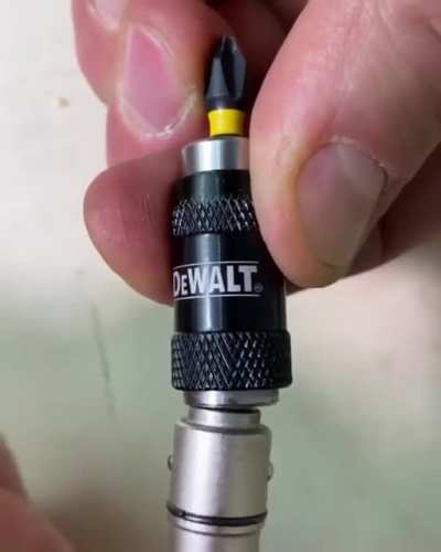 Pivot bit holder