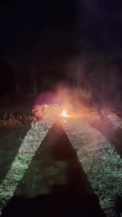 Shooting a flaming arrow at gasoline soaked Christmas trees