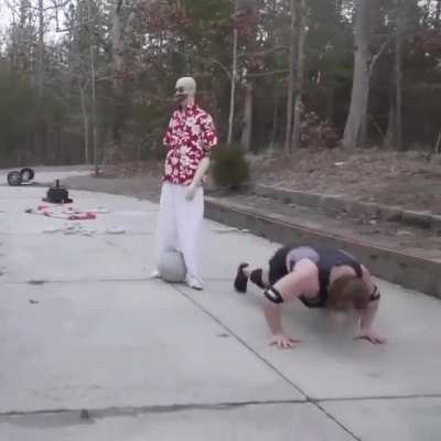 This man doing a weight obstacle course