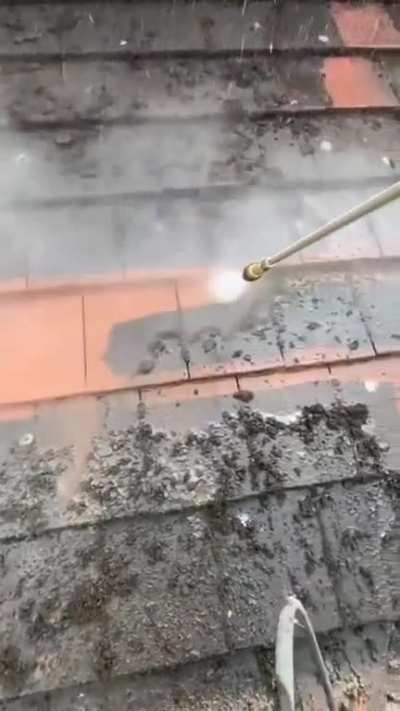 Power washing a dirty dirty roof!