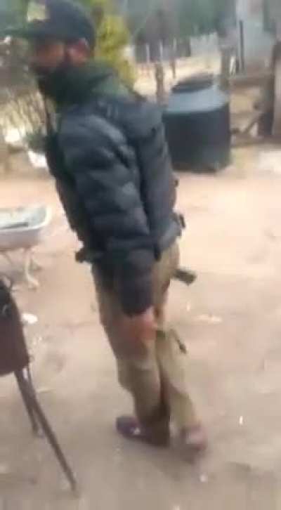 Sicarios test out plate carrier with Beretta M9 en un rancho in Sinaloa, México.