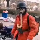 A Mcdonald's delivery guy in Coronavirus-stricken China looking like a corporate soldier in his homemade NBC gear.