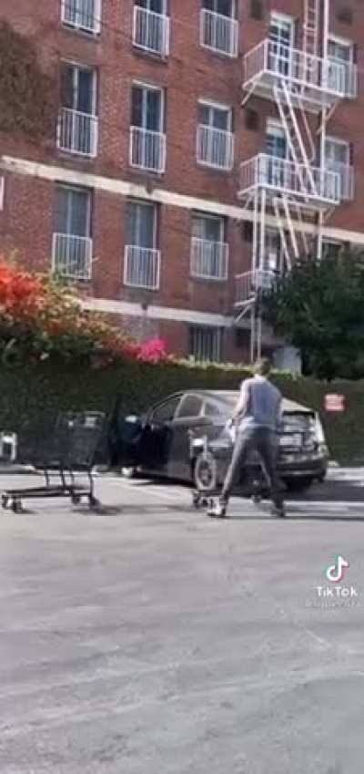 The entitled guy can't put away his shopping cart and get angry about it 🤦🏻‍♂️