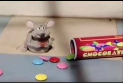 Rat enjoying his chocolate