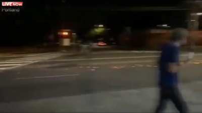 Portland Protesters shoot at vehicle