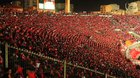 Moroccan soccer fans jumping in unison