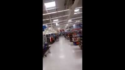 Riding a motorcycle in Walmart