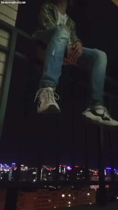 Russian teen throws himself off building
