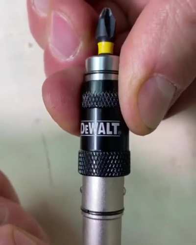 Pivot bit holder