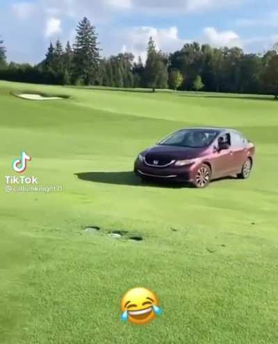 Guy drives onto golf course because a ball broke his window