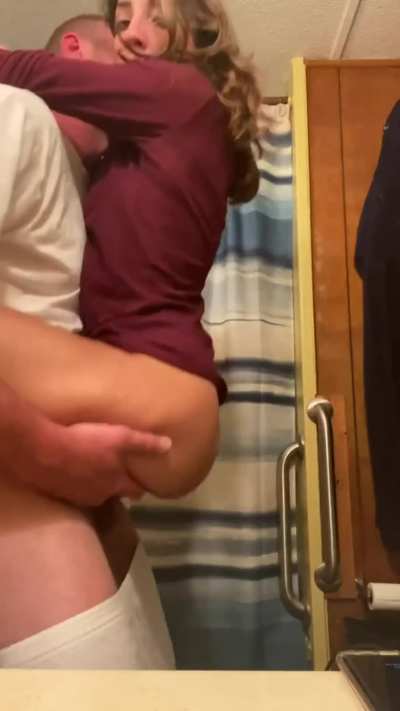 Hopping into his arms and onto his cock