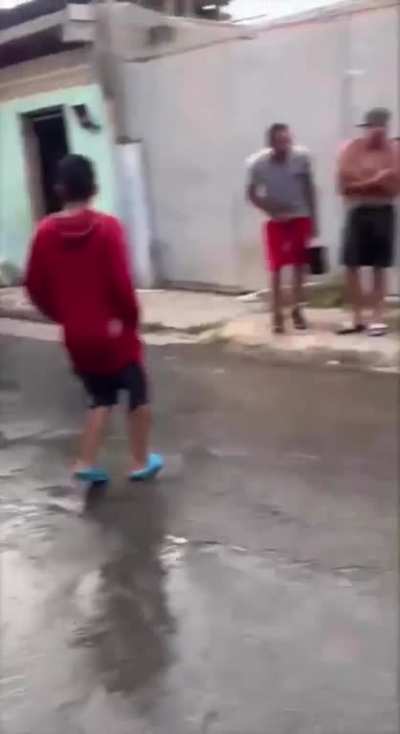 Men harassing female police officer in Venezuela