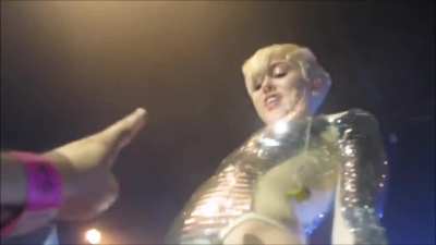 Miley Cyrus letting fans grope her at her concert