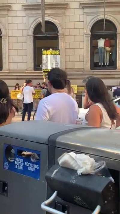 woman in Philly screaming to drown out the preachings of this Walmart version Westboro Baptist church