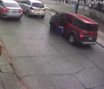 Trying to rob a car but they didn't know a surprise was waiting for them