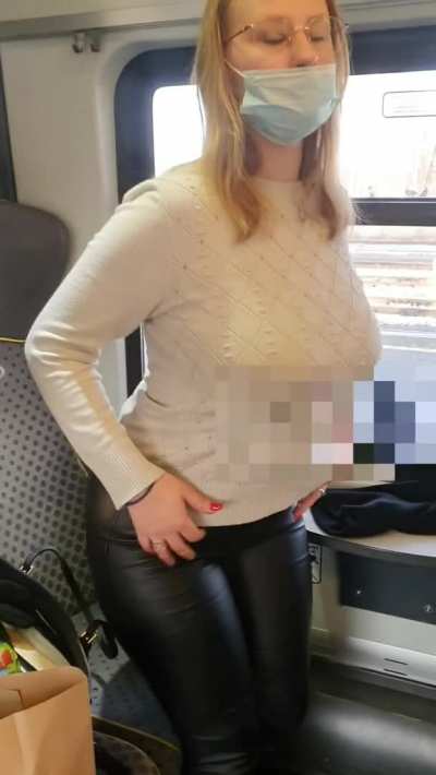 #TittyDrop AND BOOM! Big boobs quickly fall out from under a blouse on a public train.