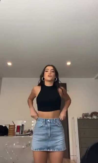 Casually rubs her tits at the end