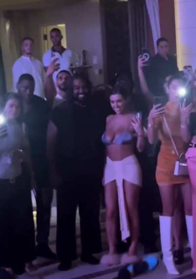 Ye vibing to a man doing weird movements