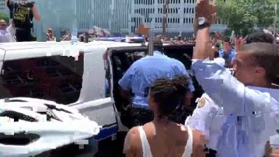 Video of woman at protest being let go by NOPD