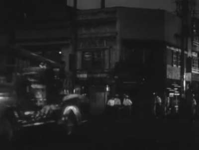Godzilla (1954) - Godzilla burns down buildings