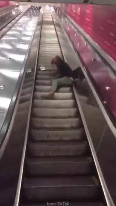 Down the escalator we go