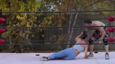 Kate suffers with a stomp,headbutt and an atomic drop