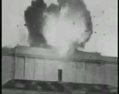 Americans blow up the swastika at the Nuremberg parade grounds.