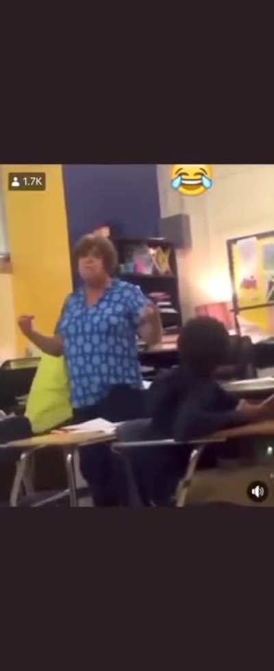 Child getting wailed on by teacher