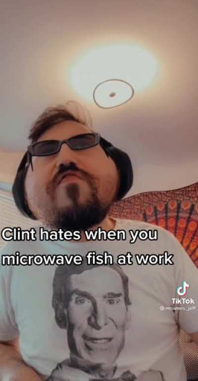 Microwaving fish at work