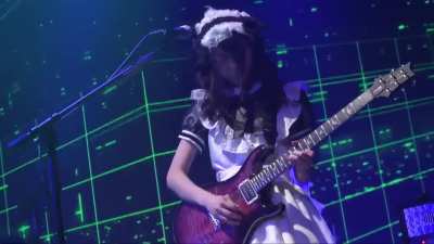 Her name is Mincho. She plays guitar. Enough said. P.1