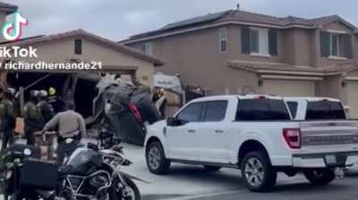 Car flying into garage