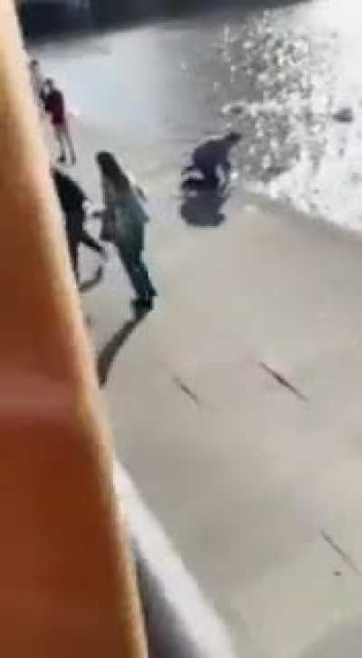 Woman demands fisherman to throw the fish back into the water. Well...
