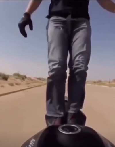 Standing on a moving bike