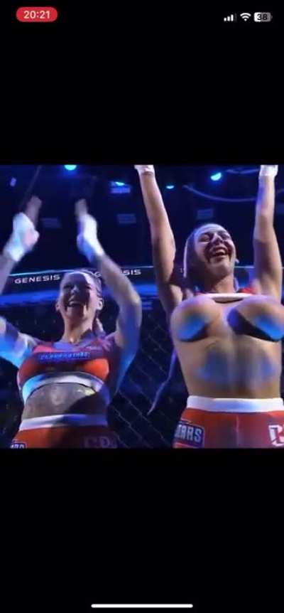 Female fighters Inked Dory and Karina Pedro flash their boobs at the crowd during MMA event in Prague