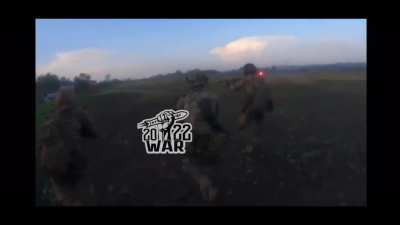 Slow-mo video of tracer round hitting foreign legion soldier's backpack in Ukraine's Kharkiv area two days ago