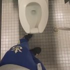 Someone forgot WHAT in an airport bathroom
