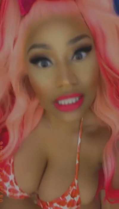 Nicki teasing her huge titties